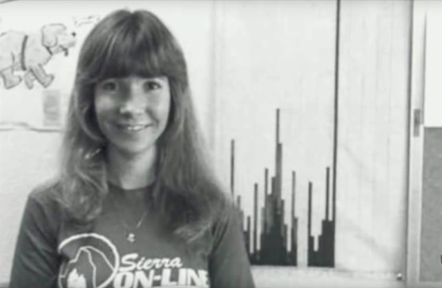 A young Roberta Williams with the Sierra On-Line t-shirt